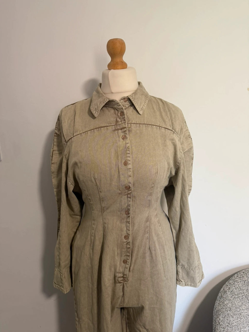 COLLUSION khaki denim jumpsuit with relaxed fit and minimalist design.