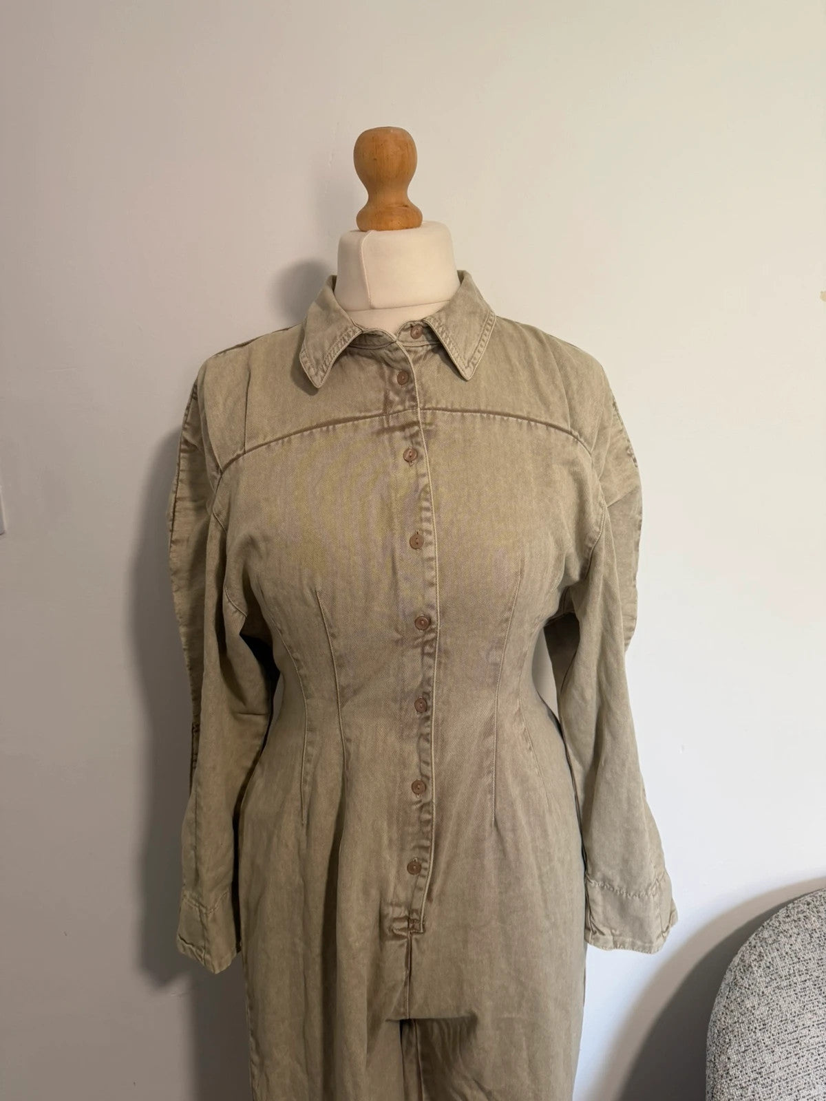 COLLUSION khaki denim jumpsuit with relaxed fit and minimalist design.