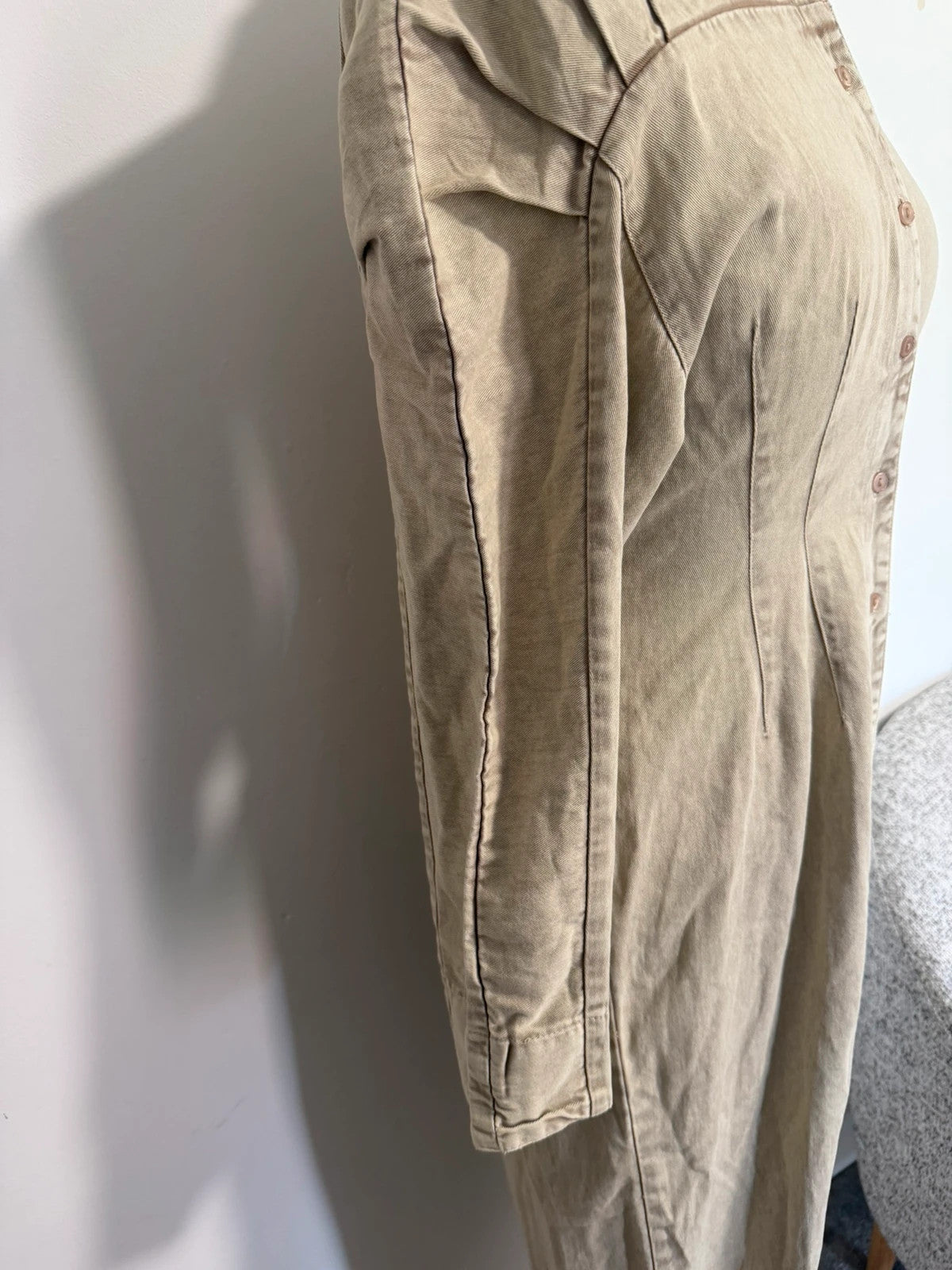 COLLUSION khaki denim jumpsuit with relaxed fit and minimalist design.