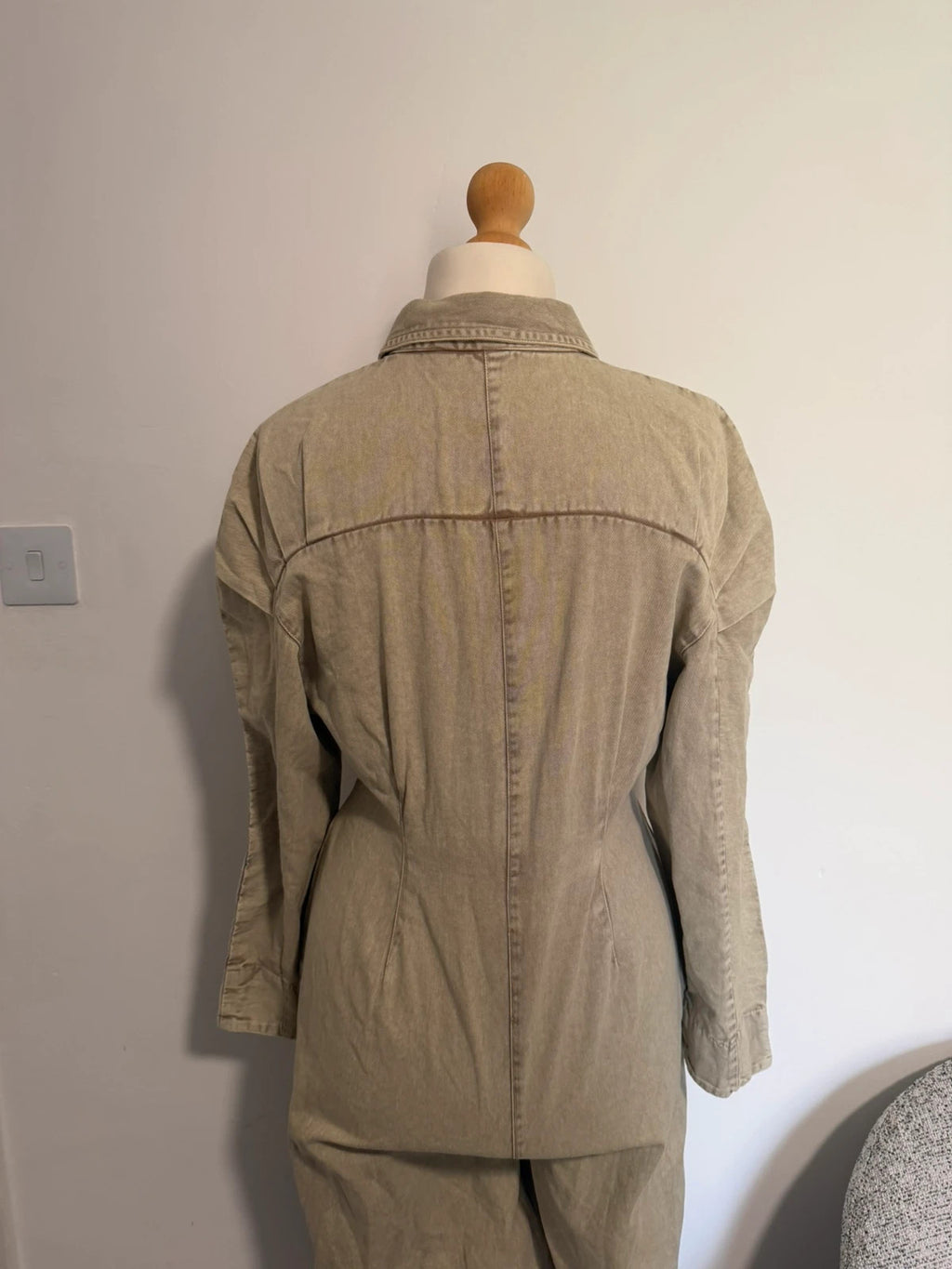 COLLUSION khaki denim jumpsuit with relaxed fit and minimalist design.