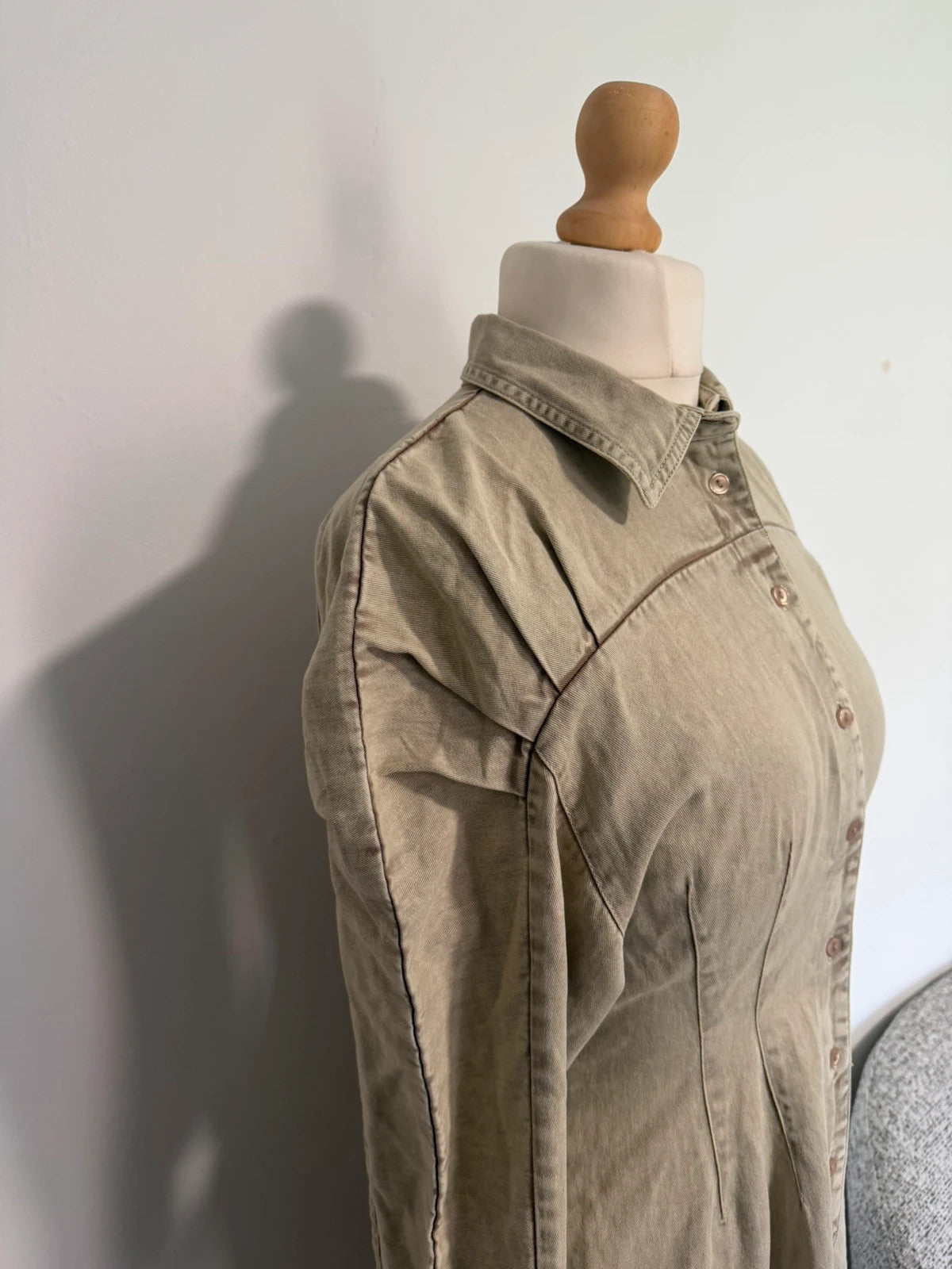 COLLUSION khaki denim jumpsuit with relaxed fit and minimalist design.