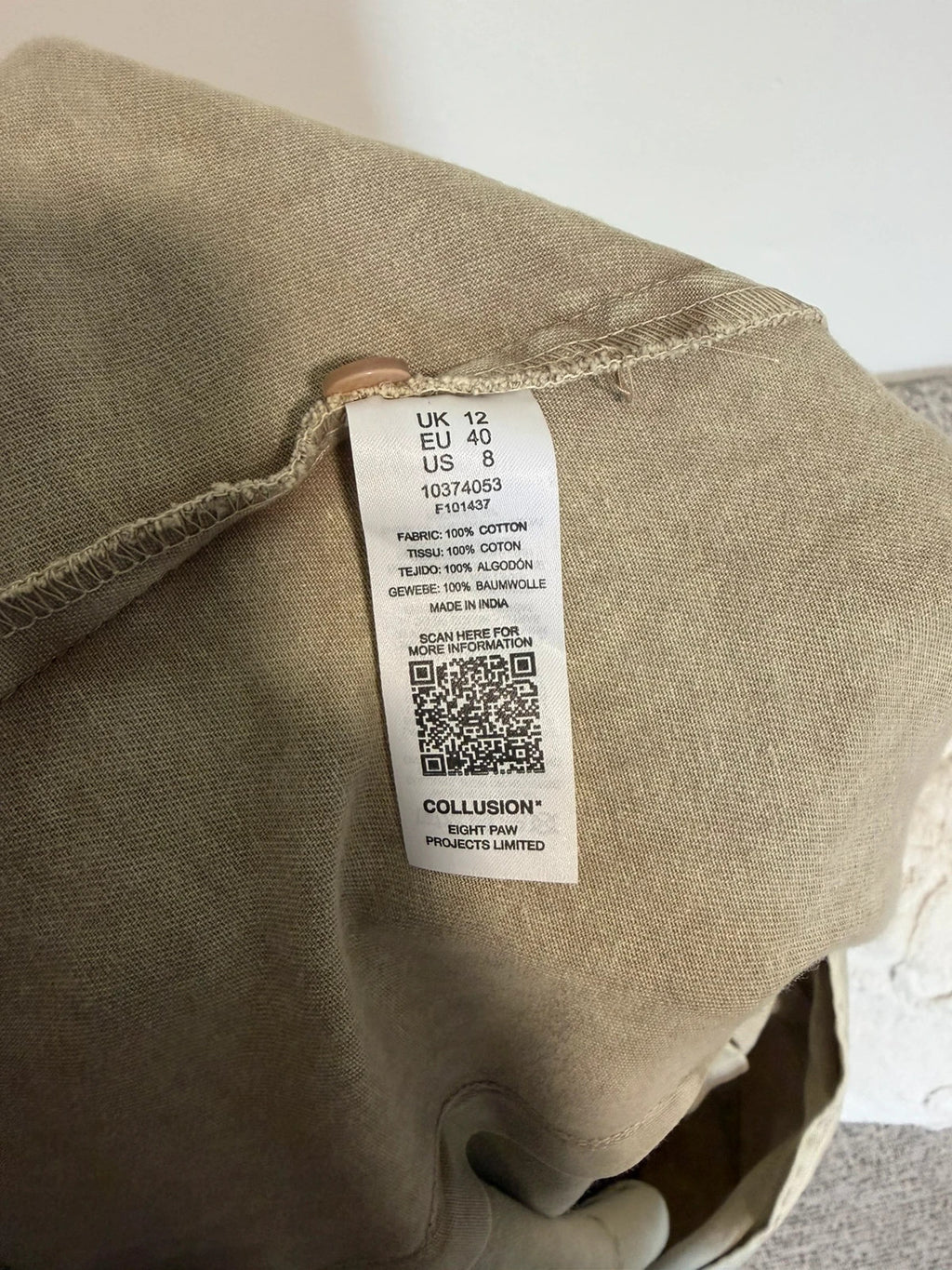COLLUSION khaki denim jumpsuit with relaxed fit and minimalist design.