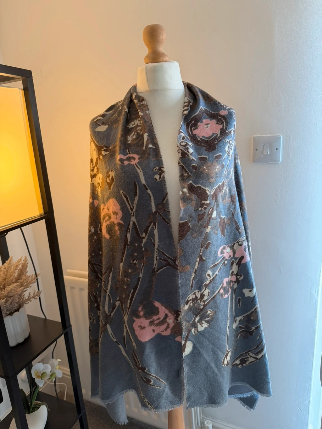 Accessorize multi floral oversized winter scarf with soft fabric and vibrant pink accents.