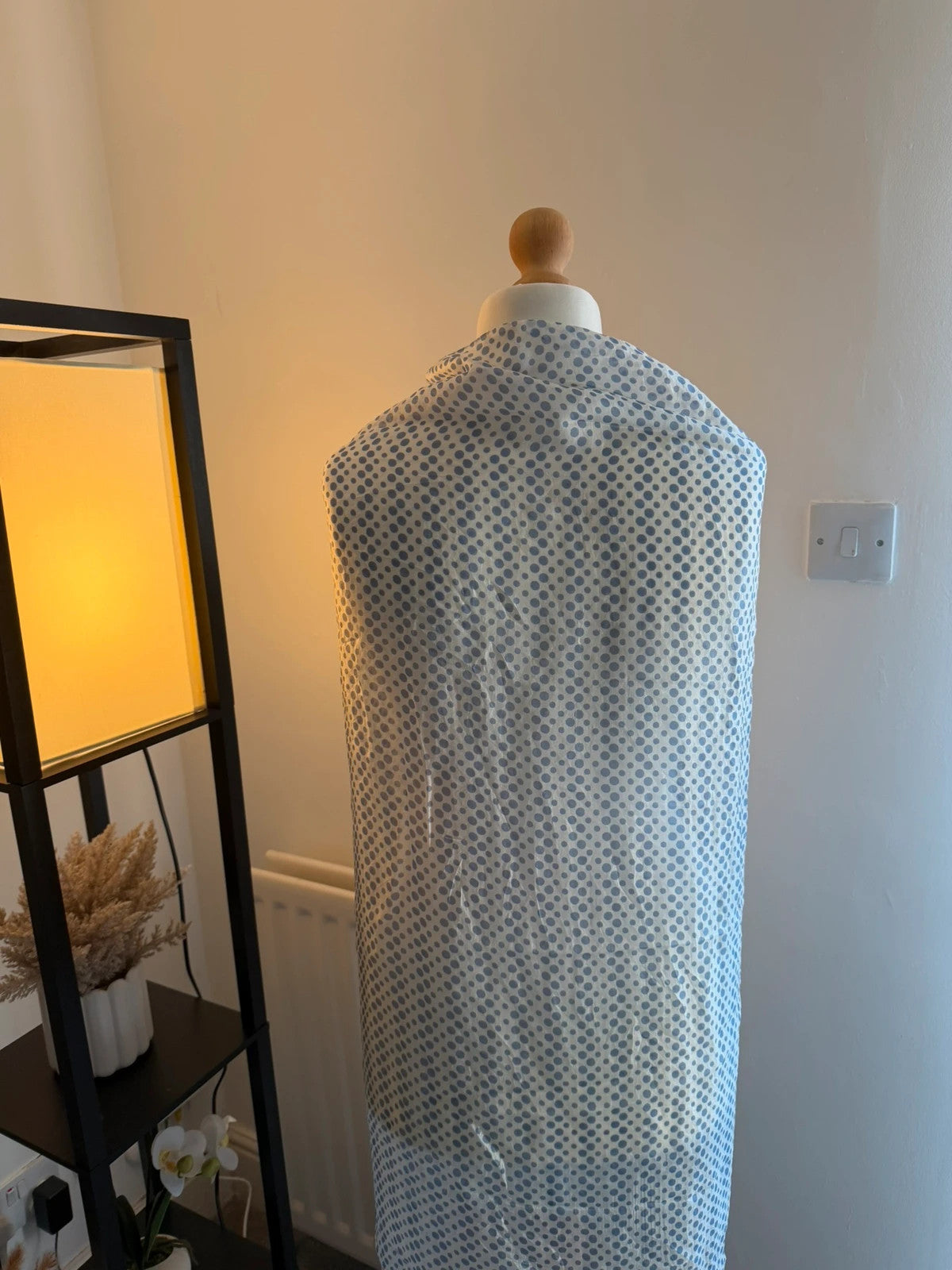 Whites blue and white polka dot lightweight summer scarf with soft fabric.