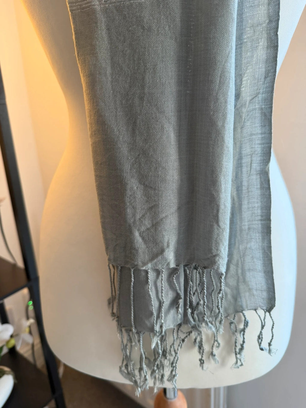 Silver metallic shimmer scarf with a sleek grey and silver finish.