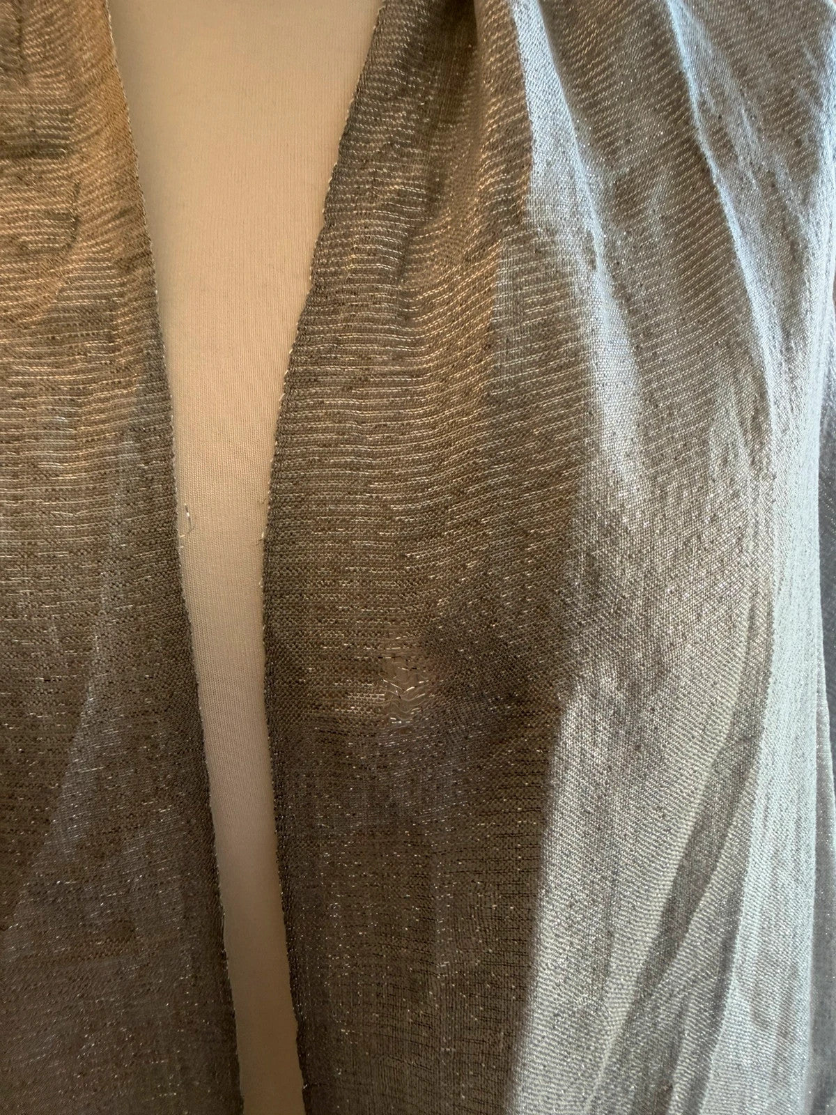Silver metallic shimmer scarf with a sleek grey and silver finish.