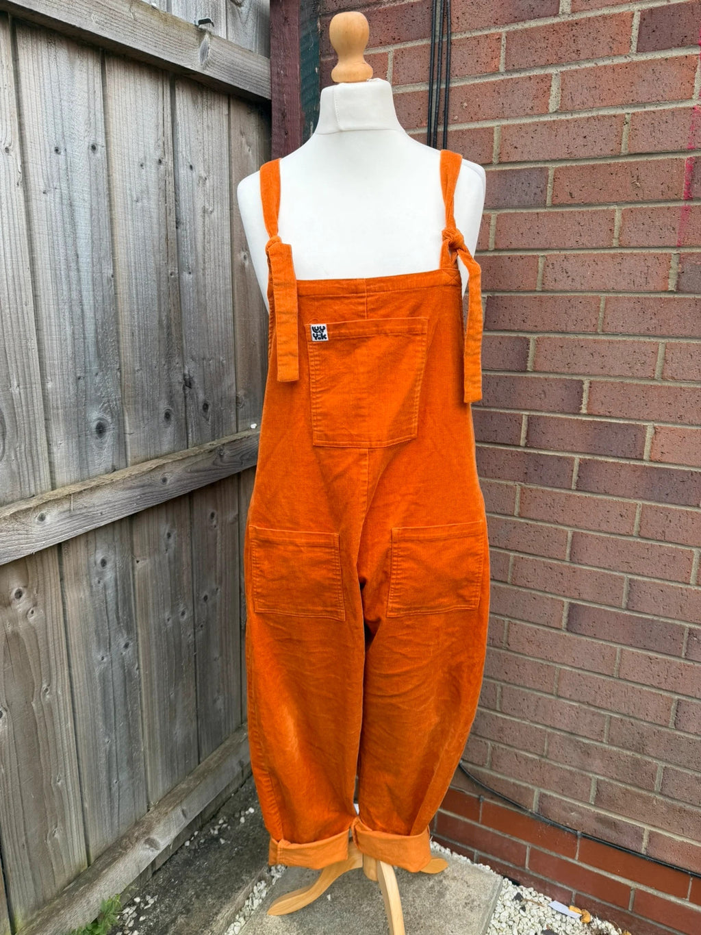Lucy & Yak orange cord dungarees relaxed fit boho pattern logo patched material