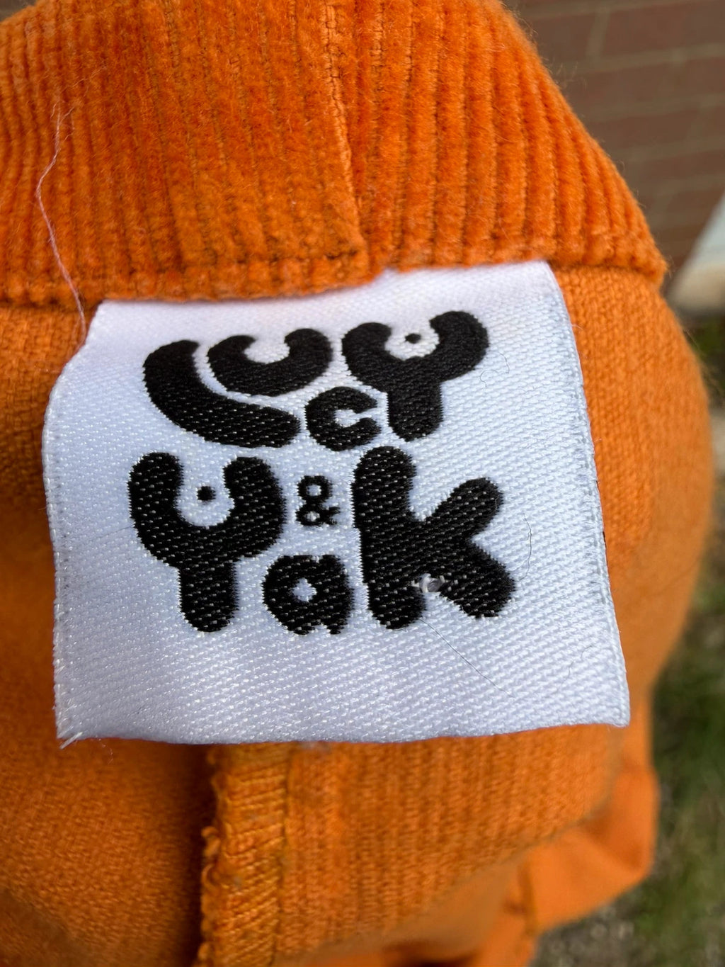 Lucy & Yak orange cord dungarees relaxed fit boho pattern logo patched material