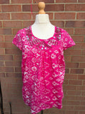 pink beaded tunic top short sleeves printed design embellishments