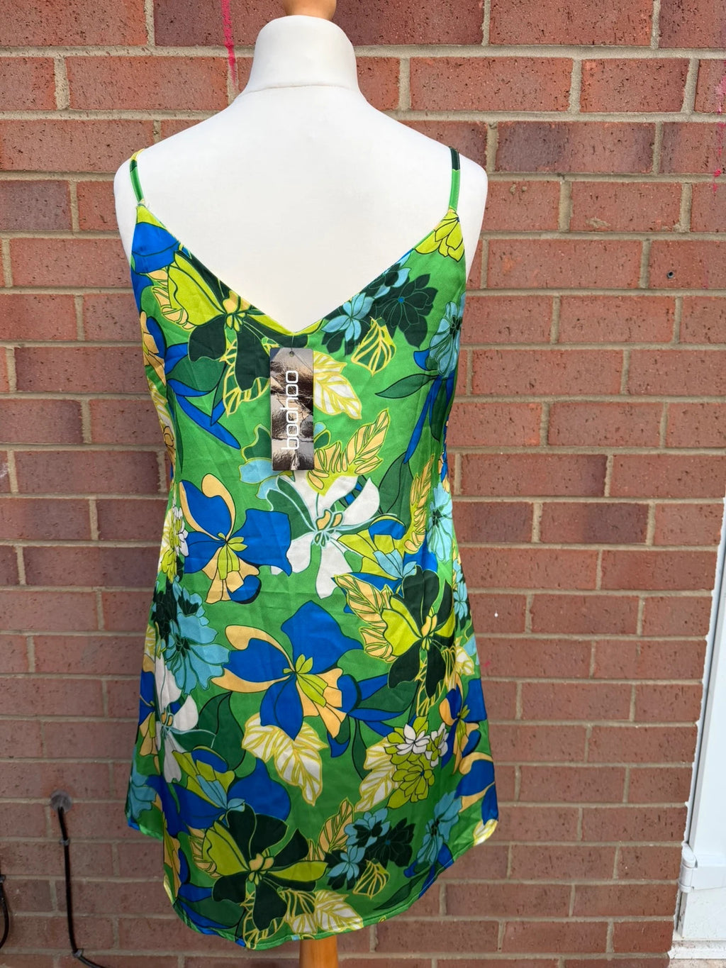 Boohoo multi tropical floral satin slip dress with cami straps and mini length.