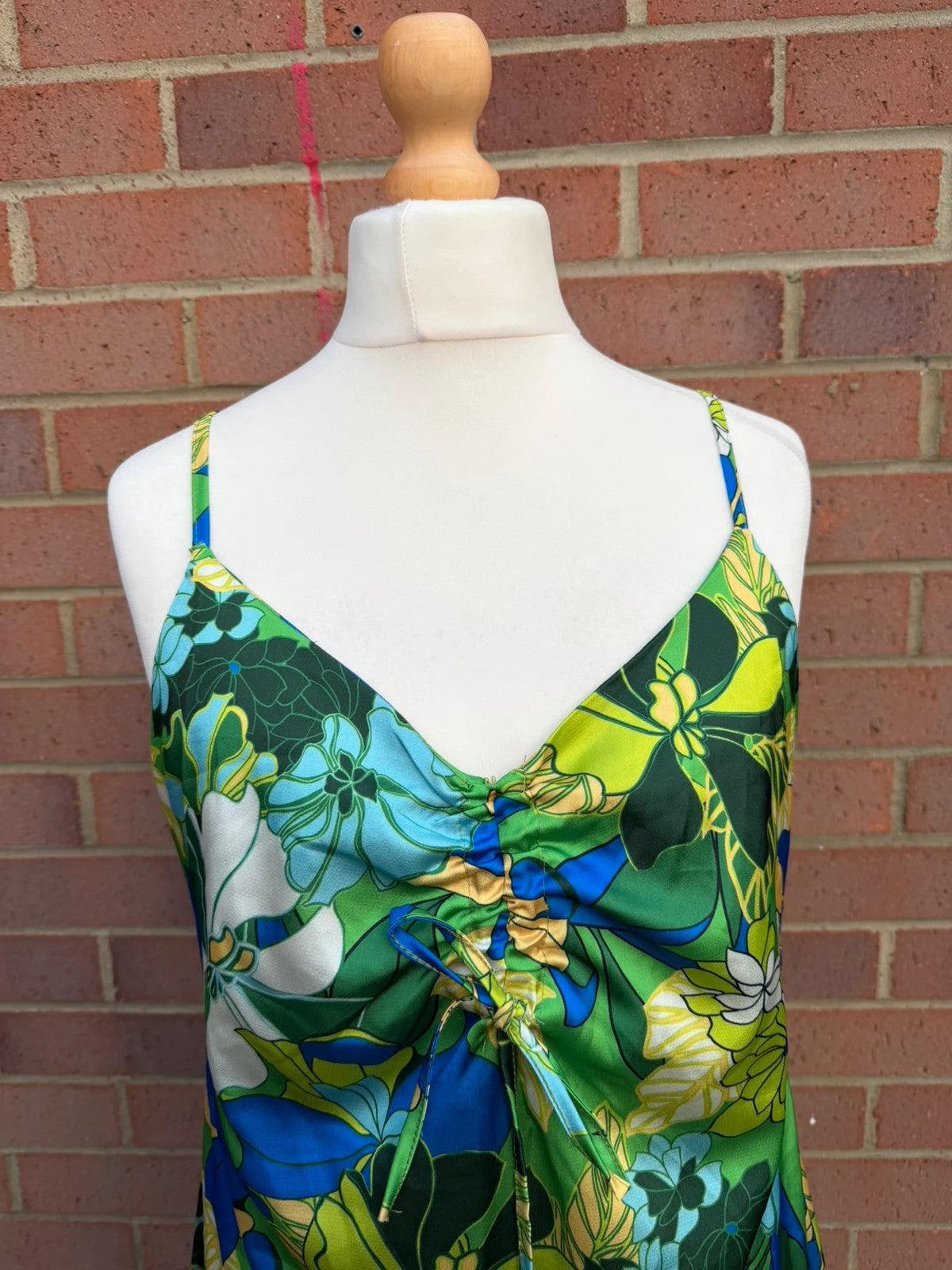 Boohoo multi tropical floral satin slip dress with cami straps and mini length.