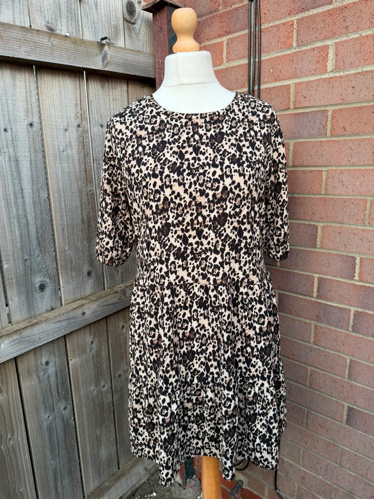 Pep&Co beige smock mini dress with leopard print pattern and 3/4 sleeves.