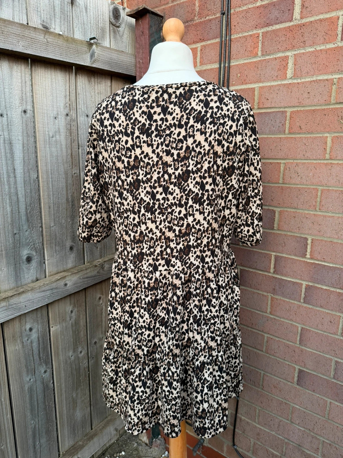 Pep&Co beige smock mini dress with leopard print pattern and 3/4 sleeves.