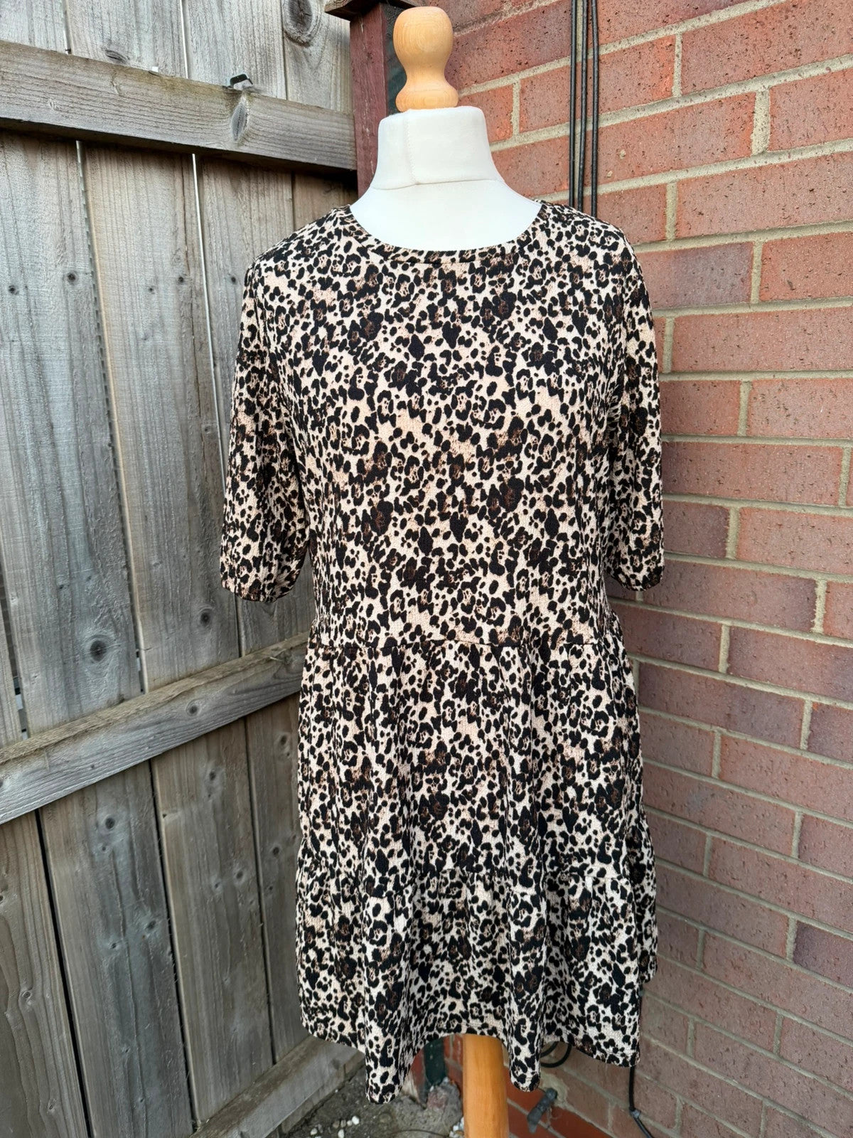 Pep&Co beige smock mini dress with leopard print pattern and 3/4 sleeves.
