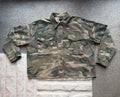 Topshop green camo shacket utility jacket with pockets and military-style design.