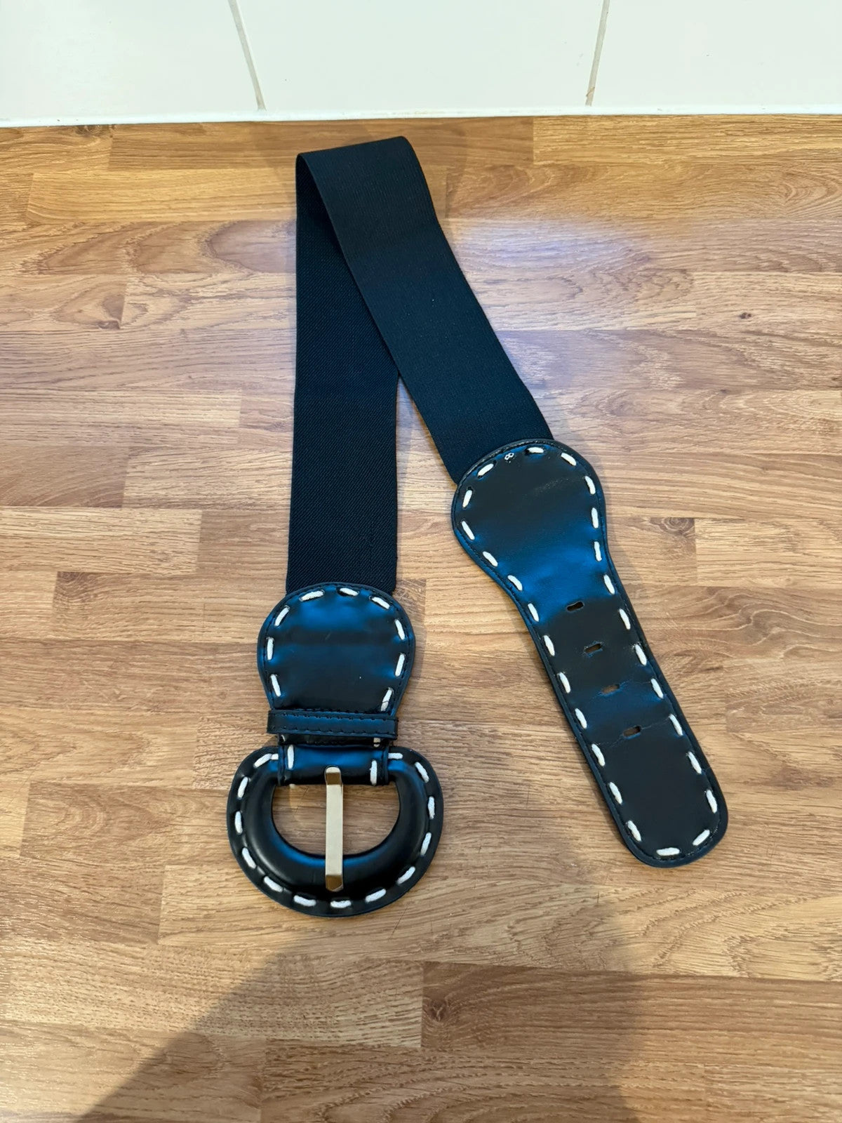 Y2K black wide stretch belt with large vintage buckle and pre-loved condition.