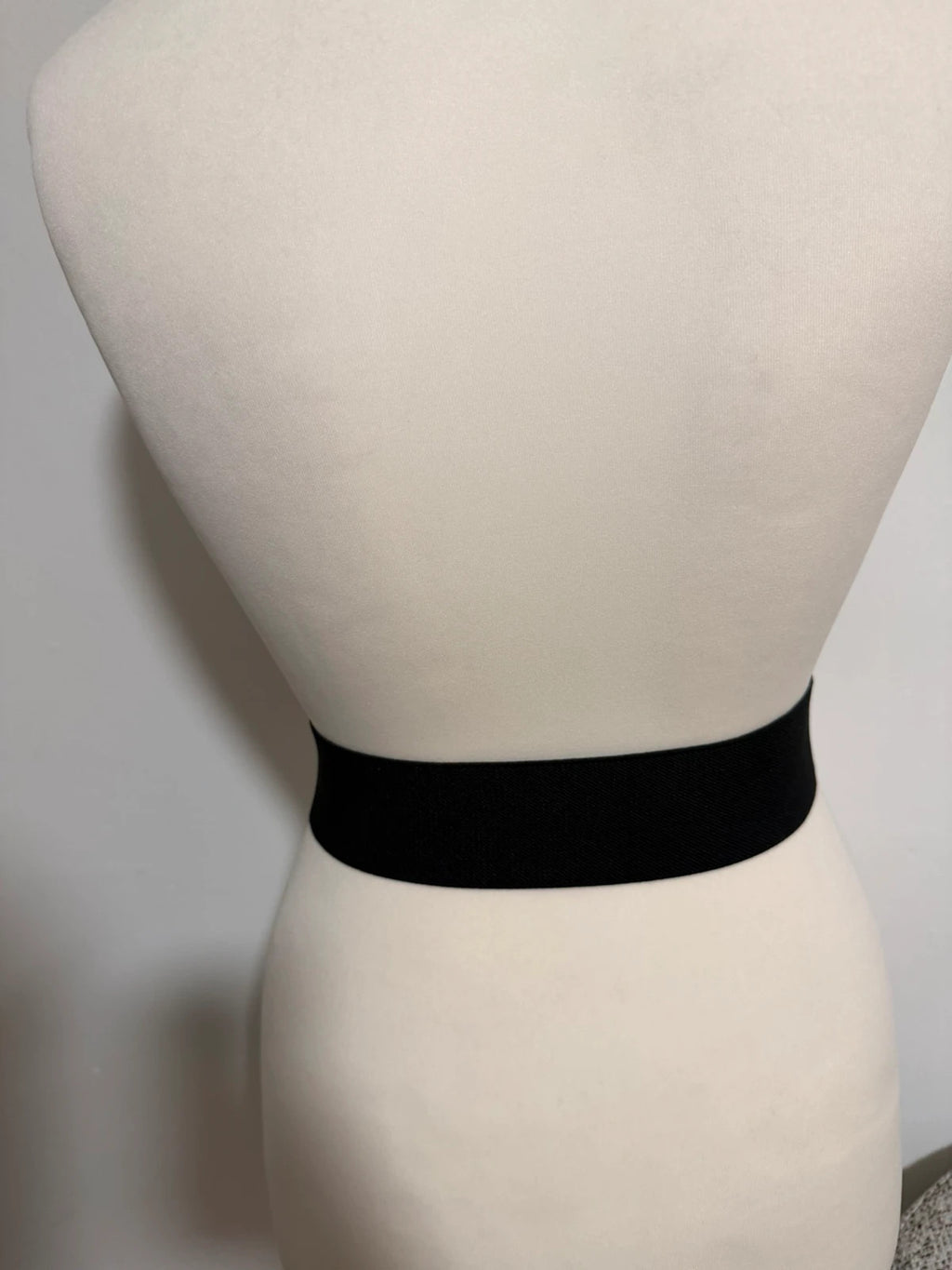 Y2K black wide stretch belt with large vintage buckle and pre-loved condition.
