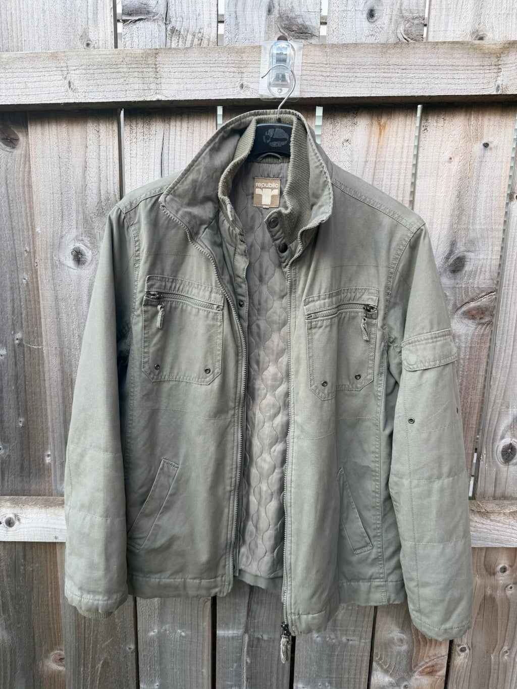 Republic khaki utility jacket with military zip, lightweight fabric, pre-loved condition.