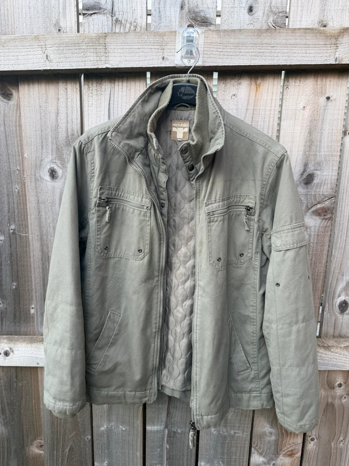 Republic khaki utility jacket with military zip, lightweight fabric, pre-loved condition.