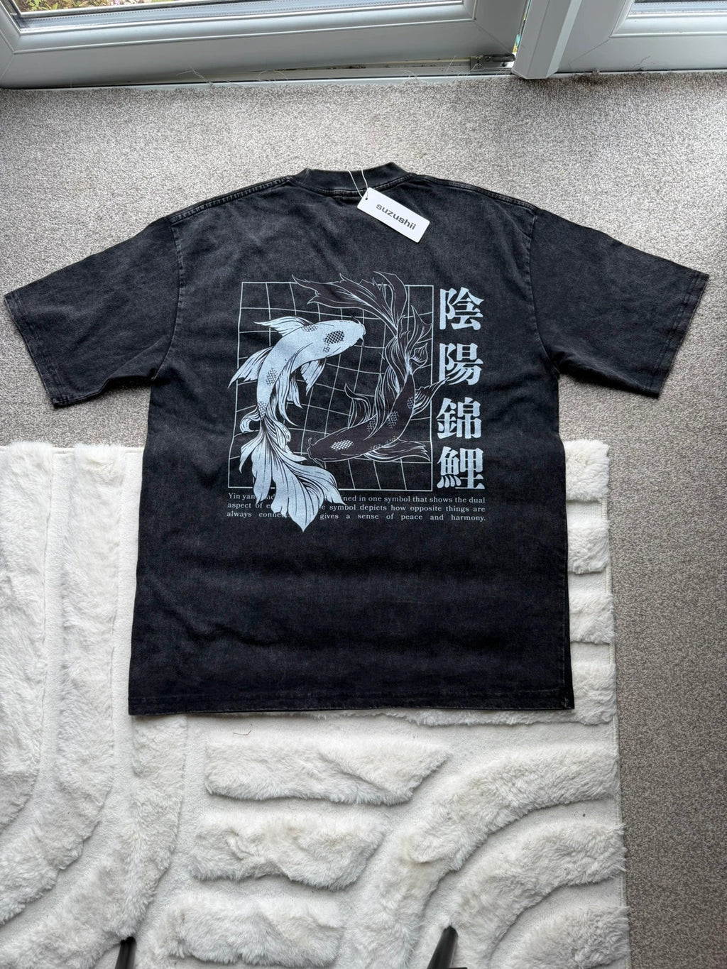 Vintage Dressing black and grey acid wash graphic tee featuring koi fish design.