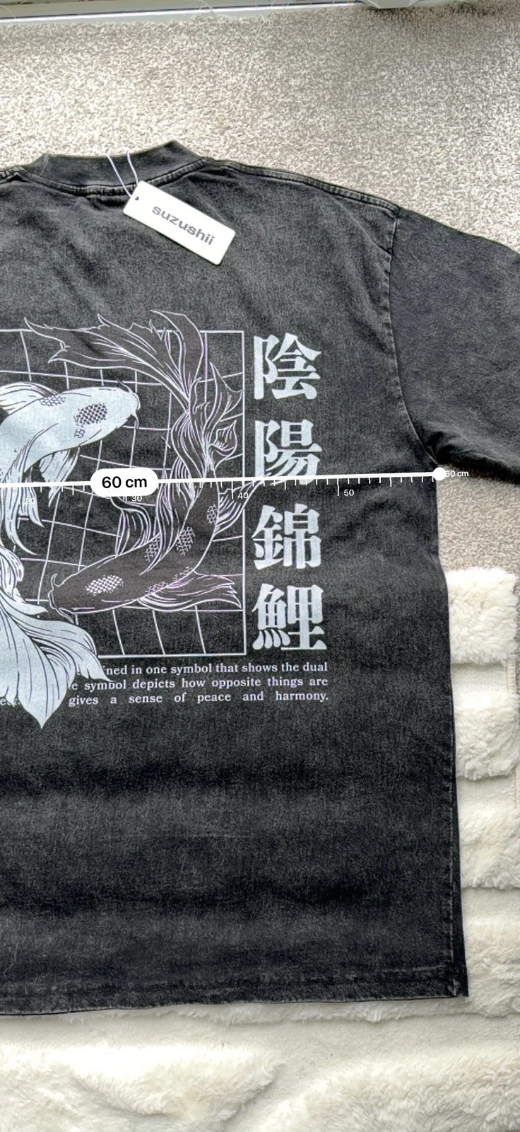 Vintage Dressing black and grey acid wash graphic tee featuring koi fish design.